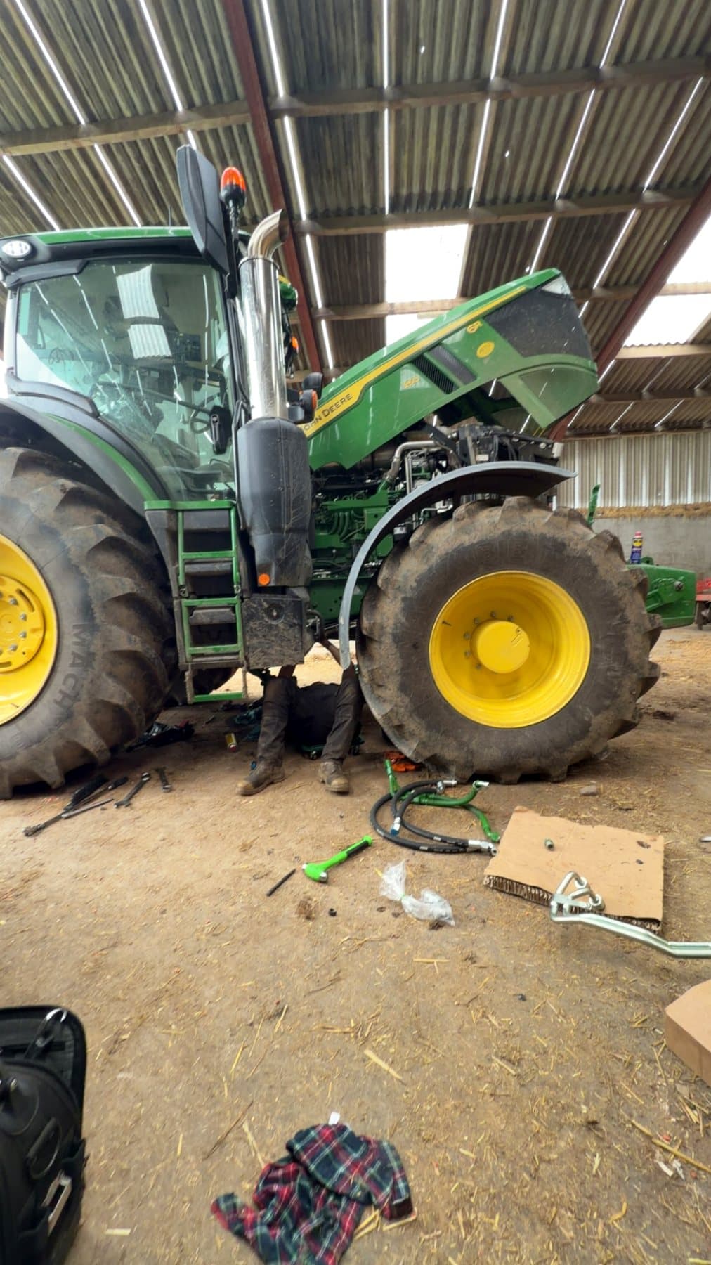 John Deere tractor undergoing workshop repair